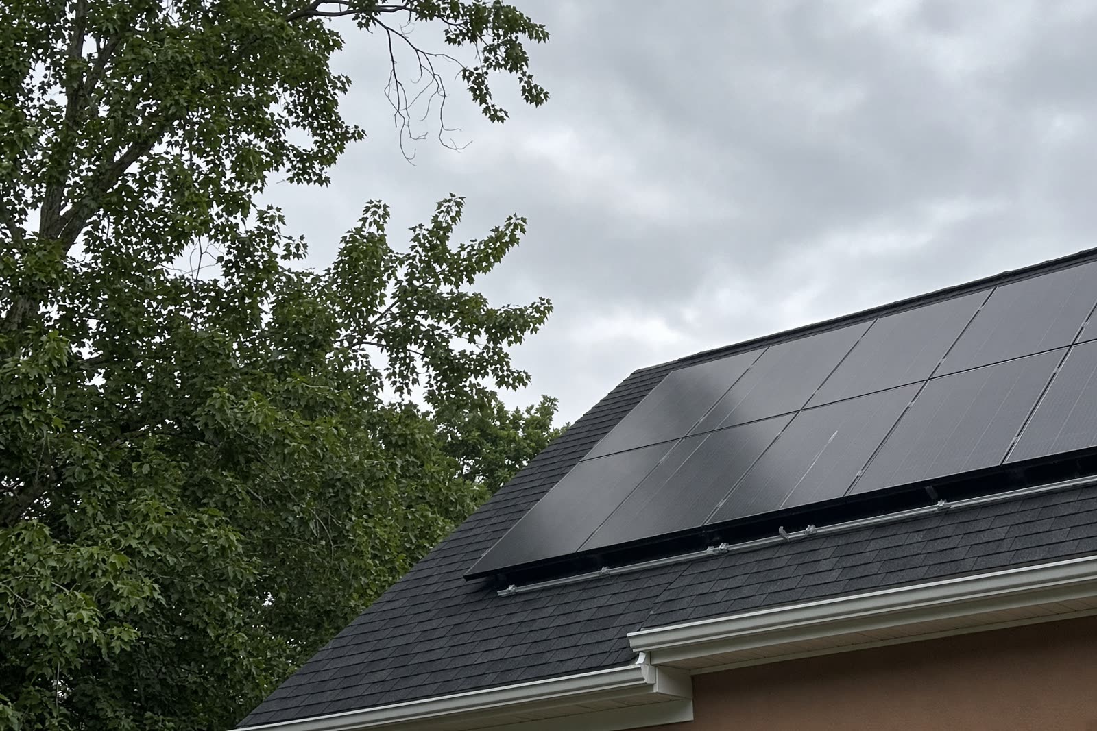 Black rooftop solar array installed by Helio GC